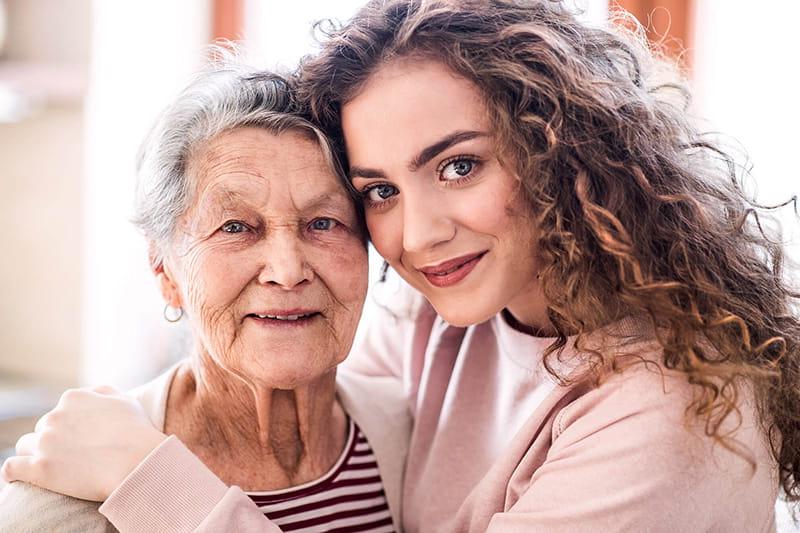 portrait of young woman with grandmother